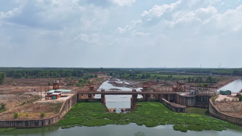 Areal view of the river and dam in Vietnam during the hot season.