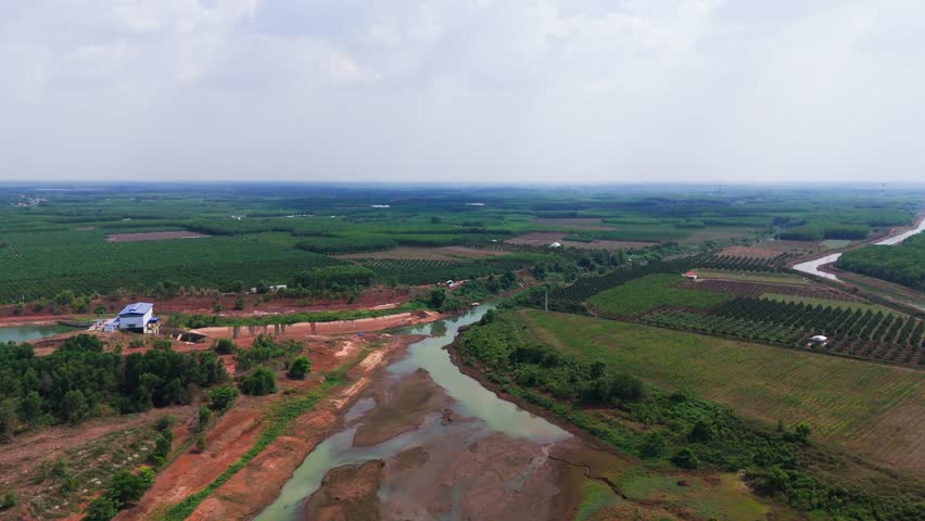 Areal view of the river and dam in Vietnam during the hot season.