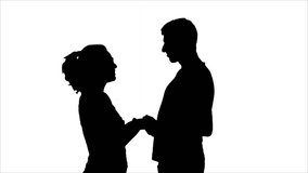 Romantic Couple Silhouette Embraced In Love. Silhouette of a happy couple embraced in a romantic scene. Backlit scene - Powered by Shutterstock - Get 15% off with code: PIKWIZARD15