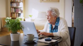 Senior woman reading notification about increased healthcare costs, bad medical test results, high utility bill. Elderly woman working on laptop, shopping online, risk of frauds and hoax for elderly - Powered by Shutterstock - Get 15% off with code: PIKWIZARD15