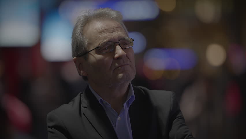 A thoughtful businessman on a deep concentration with a thoughtful expression