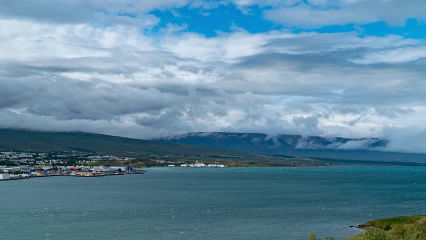 Fjord Fantasy, Time Lapse of Clouds Over Akureyri, Northern Iceland Surrender to the ethereal beauty of Iceland