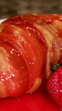 closeup of croissant sprinkled with powdered sugar with strawberries mint leaves delicious dessert french breakfast restaurant serving cook at home decorate many different videos 