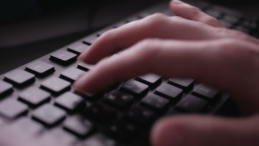 Hacker typing on computer keyboard - close up detailed footage of hands stroking keys - business concept, security, online, virus, coding, protection, social, viral | Shutterstock HD Video #34856551