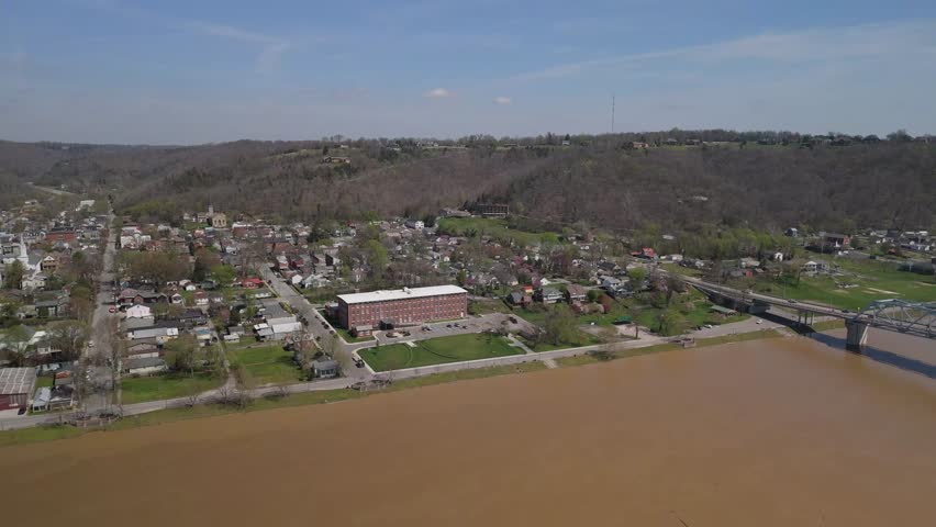 Aerial view of small American town of Madison, Indiana as seen from Ohio, river and the bridge crossing towards Kentucky