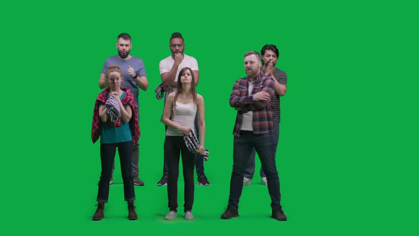 Chroma key. Group of multiethnic people or friends support football team playing in world league. Supportive sports fans stand and discuss game while watching soccer match on stadium or in sport pub.