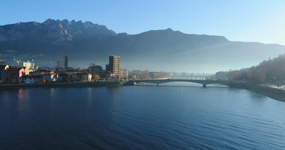 City of Lecco on Lake Como, a modern bridge that connects to the town