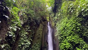 Drone video of a beautiful waterfall in Bali