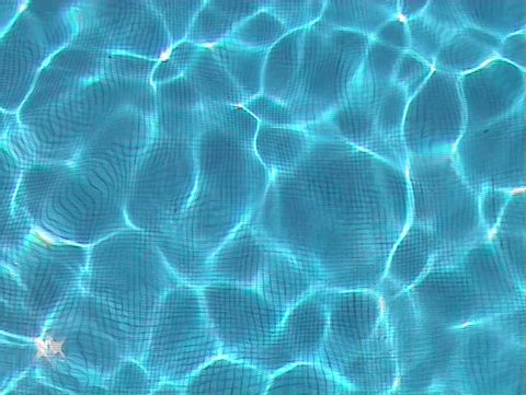 Blue water waves in swimming pool