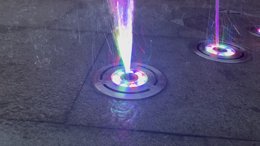 a fountain decorated with lights