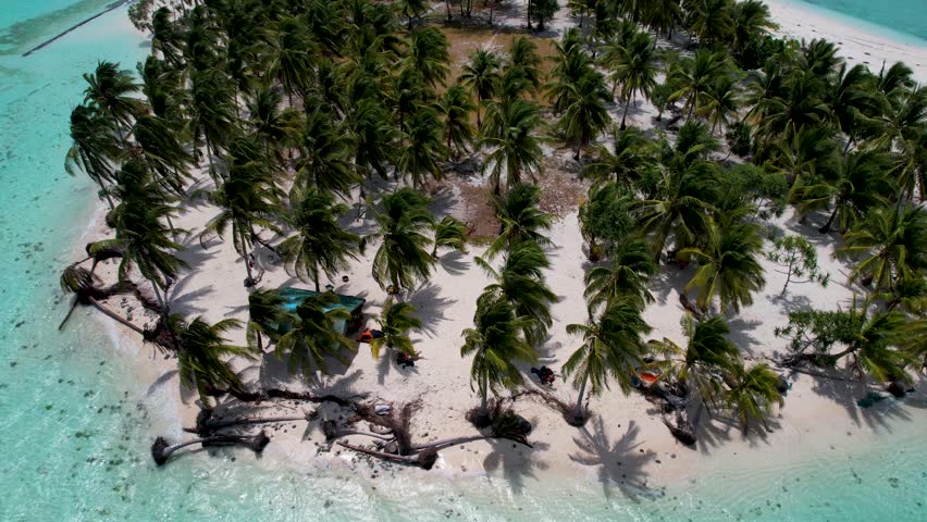 4K Aerial Drone video of beautiful tropical island Onok with white sand beaches, turtles, boats and turquoise blue water in Balabac, Philippines Royalty-Free Stock Footage #3486050477