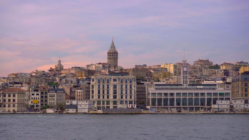 A serene slow-motion journey by boat offers a striking view of Istanbul