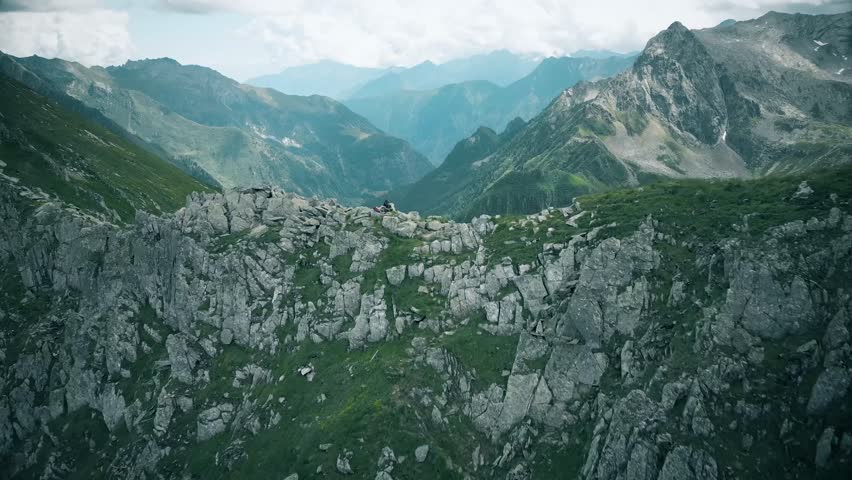 Aerial view of Italy mountains forest and deep valleys.
