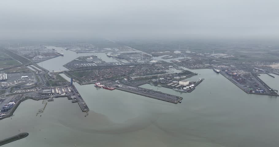 Aerial high altitude ovevriew of Zeebrugge port at Knokke Heist, industrial port and commercial industrial zone. Belgium.