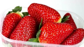 Fresh Harvest: 4K Video of Strawberries in Packaging
