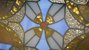 Stained glass window with a cross on the background of stained glass - Powered by Shutterstock - Get 15% off with code: PIKWIZARD15