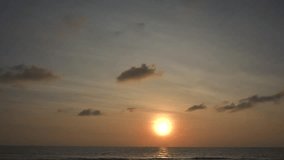 Time-lapse video of the sun setting on Khlong Klong beach on the island of Koh Lanta in Thailand.