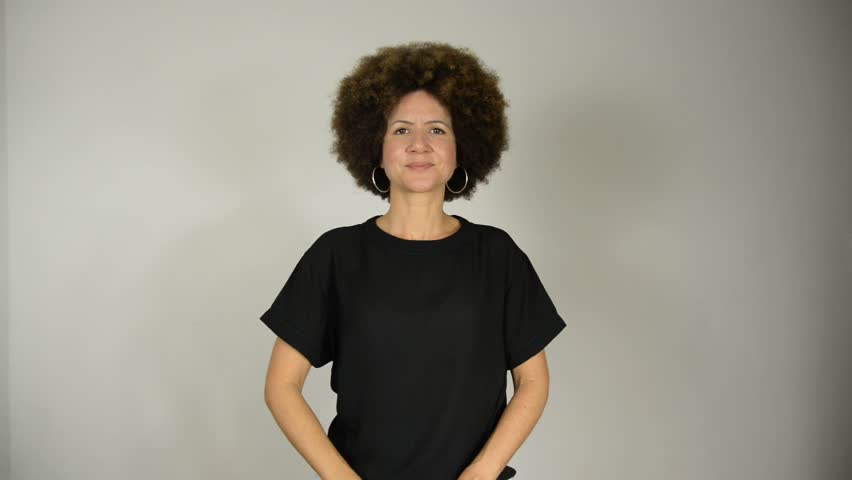 Female interpreter says the phrase everyone deserves respect in Brazilian sign language. Salvador, Bahia.
