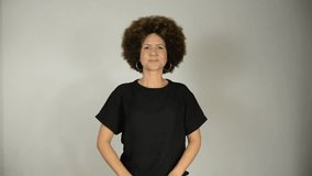 Female interpreter says the phrase everyone deserves respect in Brazilian sign language. Salvador, Bahia.
 - Powered by Shutterstock - Get 15% off with code: PIKWIZARD15