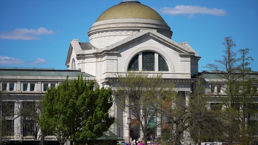 Smithsonian Museum of Natural History in Washington, DC with a clear blue sky on a spring day.