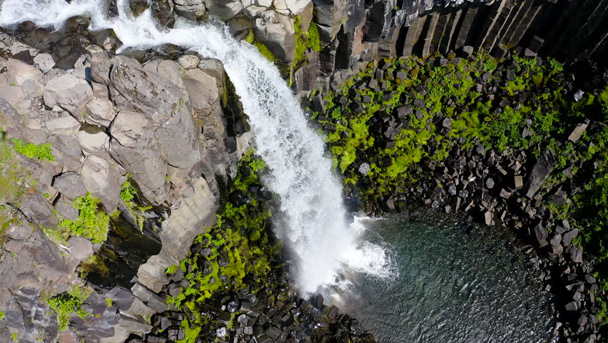 Aerial view of the spectacular Svartifoss waterfall, into the Skaftafell area of Vatnajokull National Park provides visitors with a breathtaking view of Svartifoss (Black Falls).