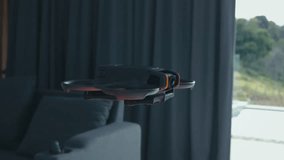 Drone flying indoors close-up powerful tool for stunning aerial imagery. Ability to capture video and photos drone exemplifies cutting-edge technology behind modern drones drone quadcopter.