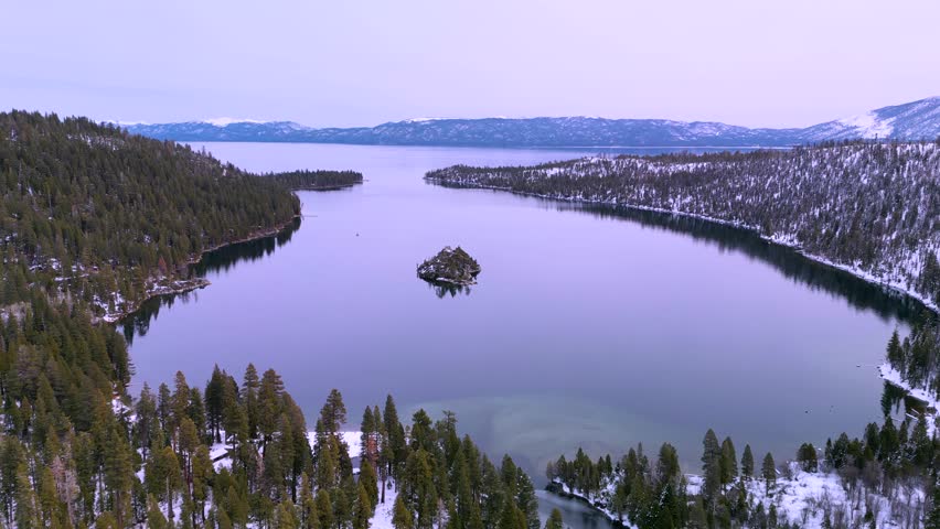 Aerial drone view of Emerald Bay, Lake Tahoe, California pink golden hour