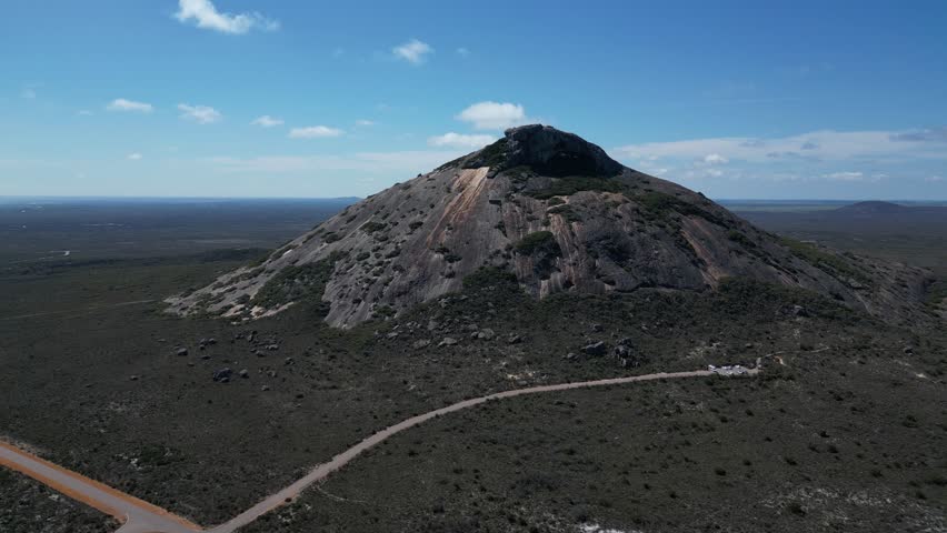 Frenchman Peak in Cape Le Grand National Park near Esperance, Western Australia. Aerial forward