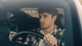 Sad Caucasian man auto driver inside car on parking lot displeased frustrated male businessman using mobile phone read bad news smartphone message upset anxious stressed guy driving travel in city - Powered by Shutterstock - Get 15% off with code: PIKWIZARD15