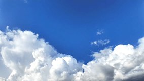 Blue sky white clouds time lapse, Summer blue sky time lapse. Nature weather blue sky. White clouds background. Cloud time lapse , video loop
