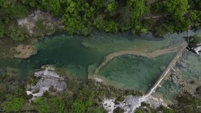 Aerial drone 4k video of amazing clear water pond