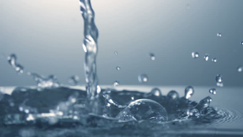 Close up of splash of water. Slow motion.