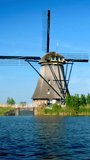 Netherlands rural village scenic view - windmills at famous tourist site Kinderdijk in Holland. Kinderdijk , Netherlands