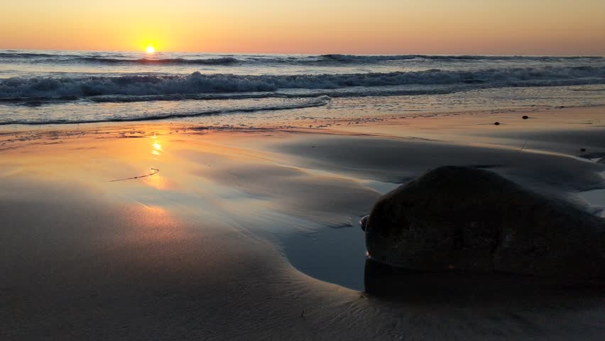 Southern California beaches, waves, sunsets, surfers, tide pools and palms trees in Encinitas California.