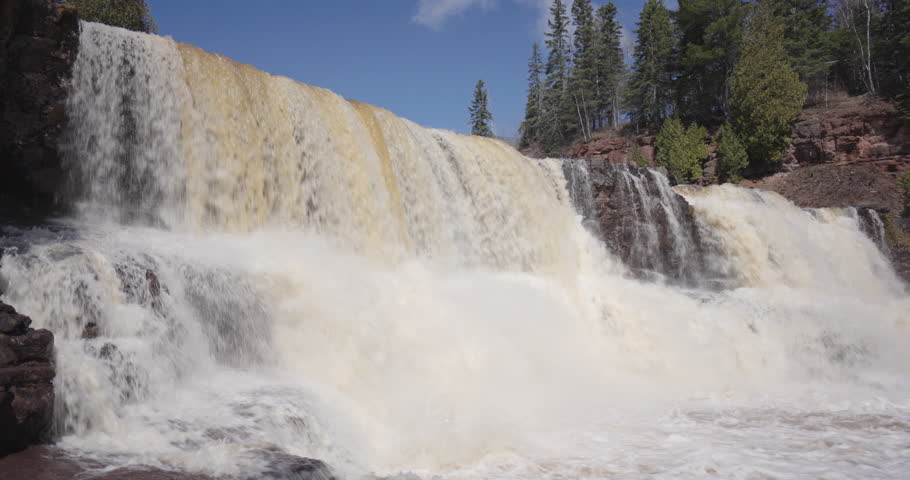 Gooseberry Falls Flowing Over Rocks in Sunny Weather