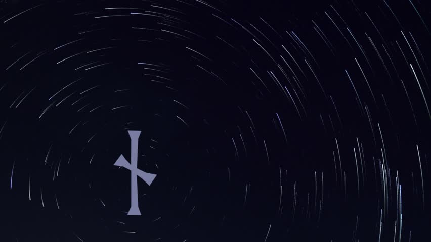 video of a Star trail in the background, 
with in the foreground the image of a rune 
moving towards the polar star of the same star trail, 
the rune in this clip is Nauthiz