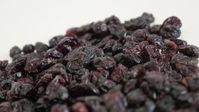 Tasty Vaccinium oxycoccos slow pan 4K 2160p 30fps UltraHD footage - Dehydrated cranberries close-up 3840X2160 UHD panning video