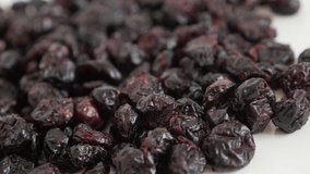Dehydrated cranberries close-up slow pan 4K 2160p 30fps UltraHD footage - Tasty Vaccinium oxycoccos 3840X2160 UHD panning video
