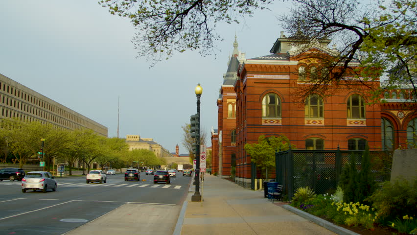 The shot pans left from the Smithsonian Castle to the Department of Energy across Independence Avenue in Washington DC