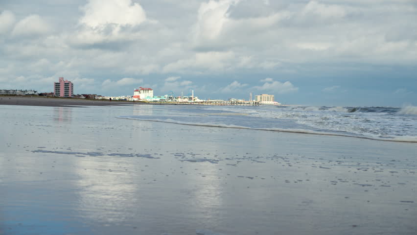 Tide Moves on New Jersey Coastline over Ocean City Skyline in Slow Motion