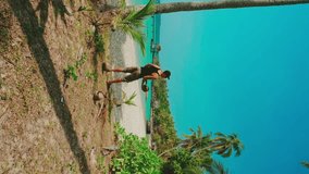 Active lifestyle travel people enjoy amazing tropical beach and play with coconut on nature background Slow motion video