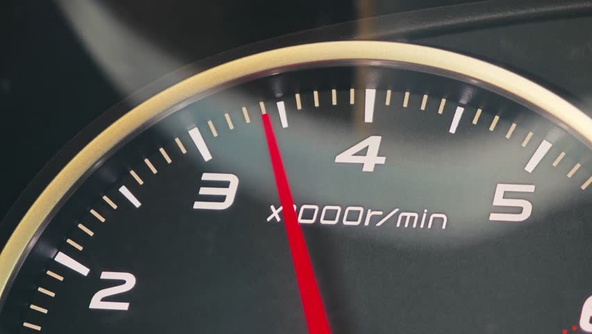 Car tachometer displaying engine speed in rpm
