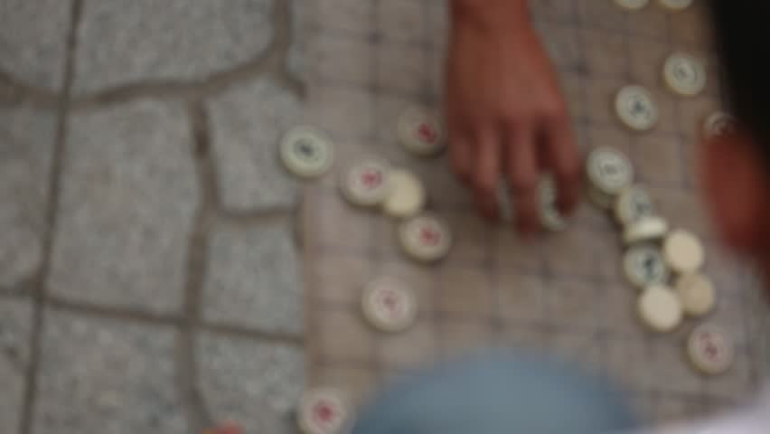 Tables and game pieces for XiangQi Boardgame, also known as Chinese Chess, Hoi An, Vietnam