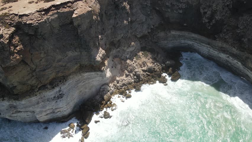 Drone aerial pan up over the Great Australian Bight and blue ocean