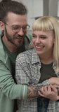 portrait of caucasian man and woman couple in love at home happy smile slow motion
