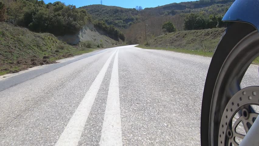 Motorcycle Riding in Curvy Twisty Countryside Road, Front Wheel Side View from the Left, Time Warp Video