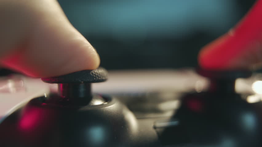 Gamer playing video game with game controller - Powered by Shutterstock - Get 15% off with code: PIKWIZARD15