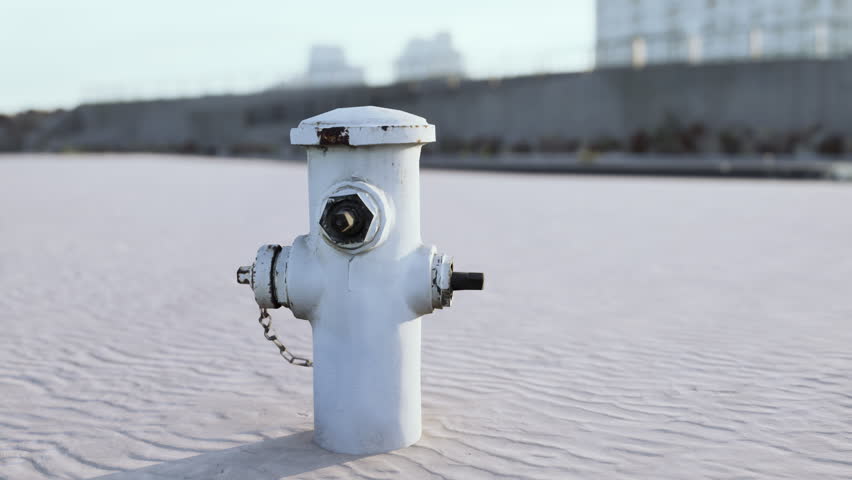 old hydrant on a seaside promenade
