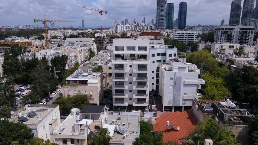 High crane working on building construction on Bublick Street, Tel Aviv, Israel