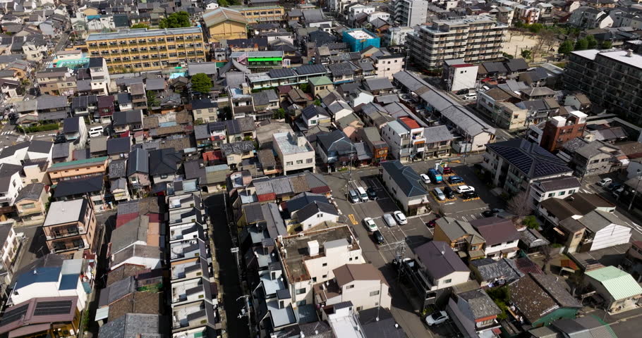 Residential Area In City Of Kyoto In Kansai, Japan. aerial tilt-up shot